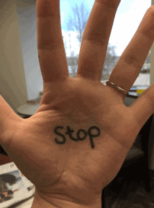 STOP hand