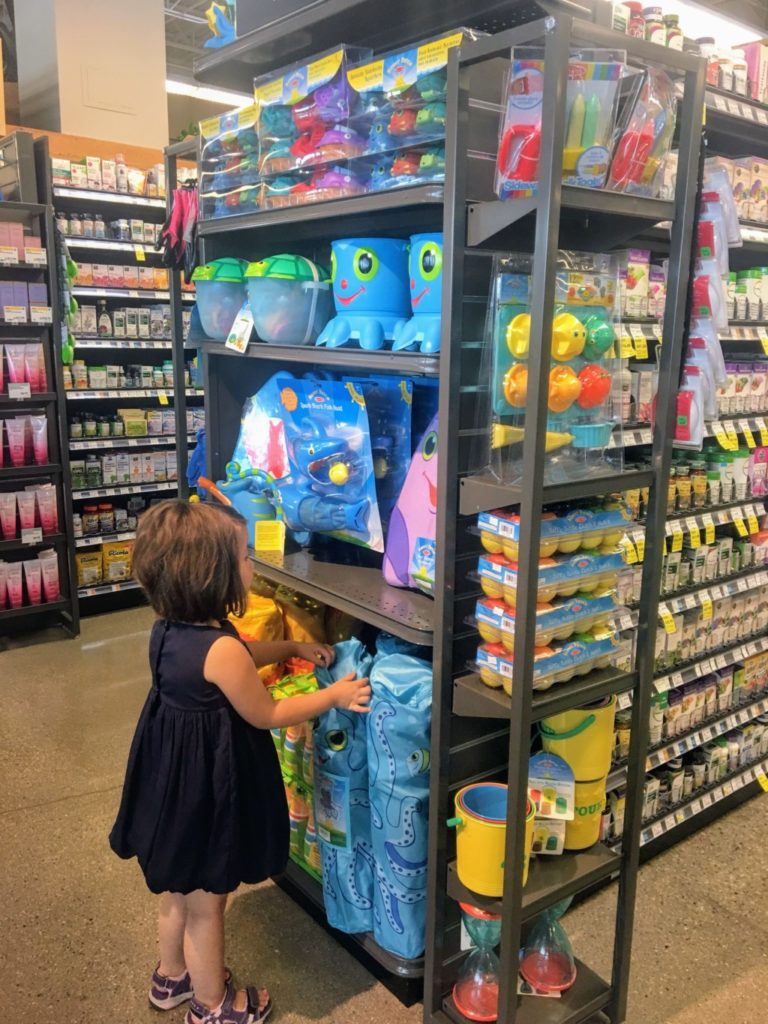 My niece checking out some of the pool toys.