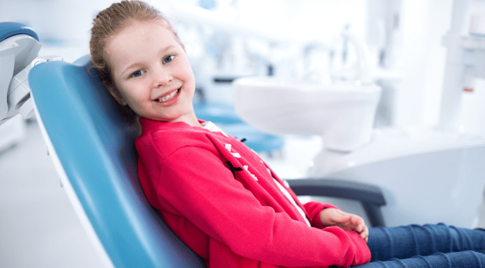 Title Image:Smiling Girl at Dentist